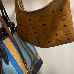 I am selling in the MCM purse for 150 in good condition